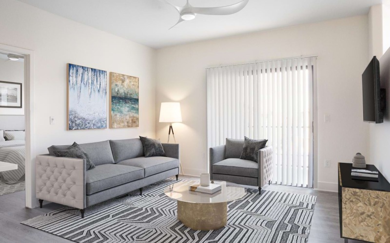 a living room with a rug and a fan